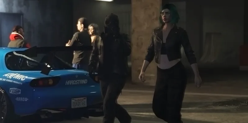 A blue Supra and club members on a lit street at night in GTA V.